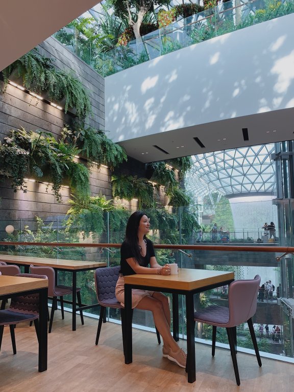 YOTELAIR Singapore Changi Airport - guest enjoying view of waterfall vortex